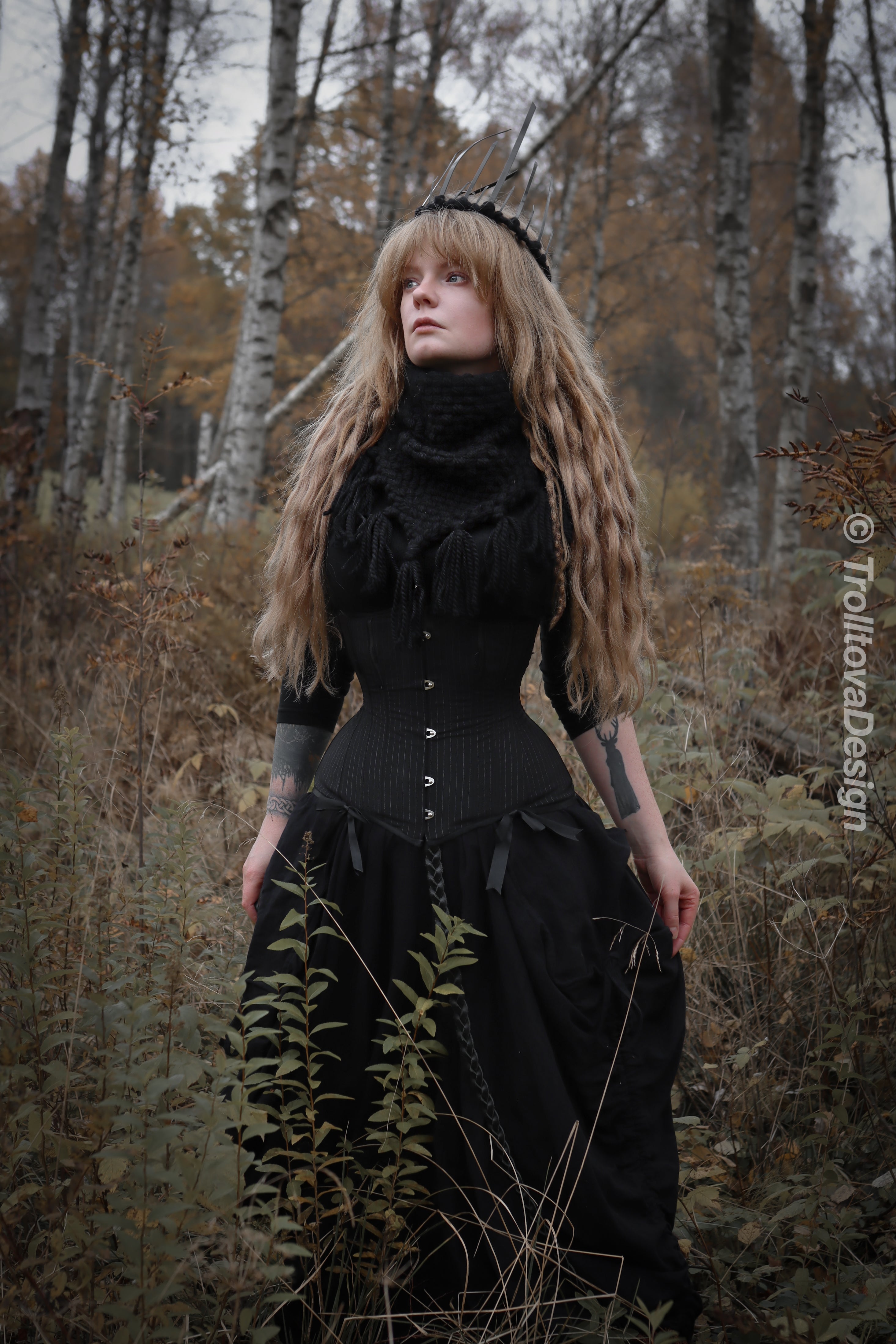 Handwoven triangle scarf in black wool and alpaca made from scrap yarn.