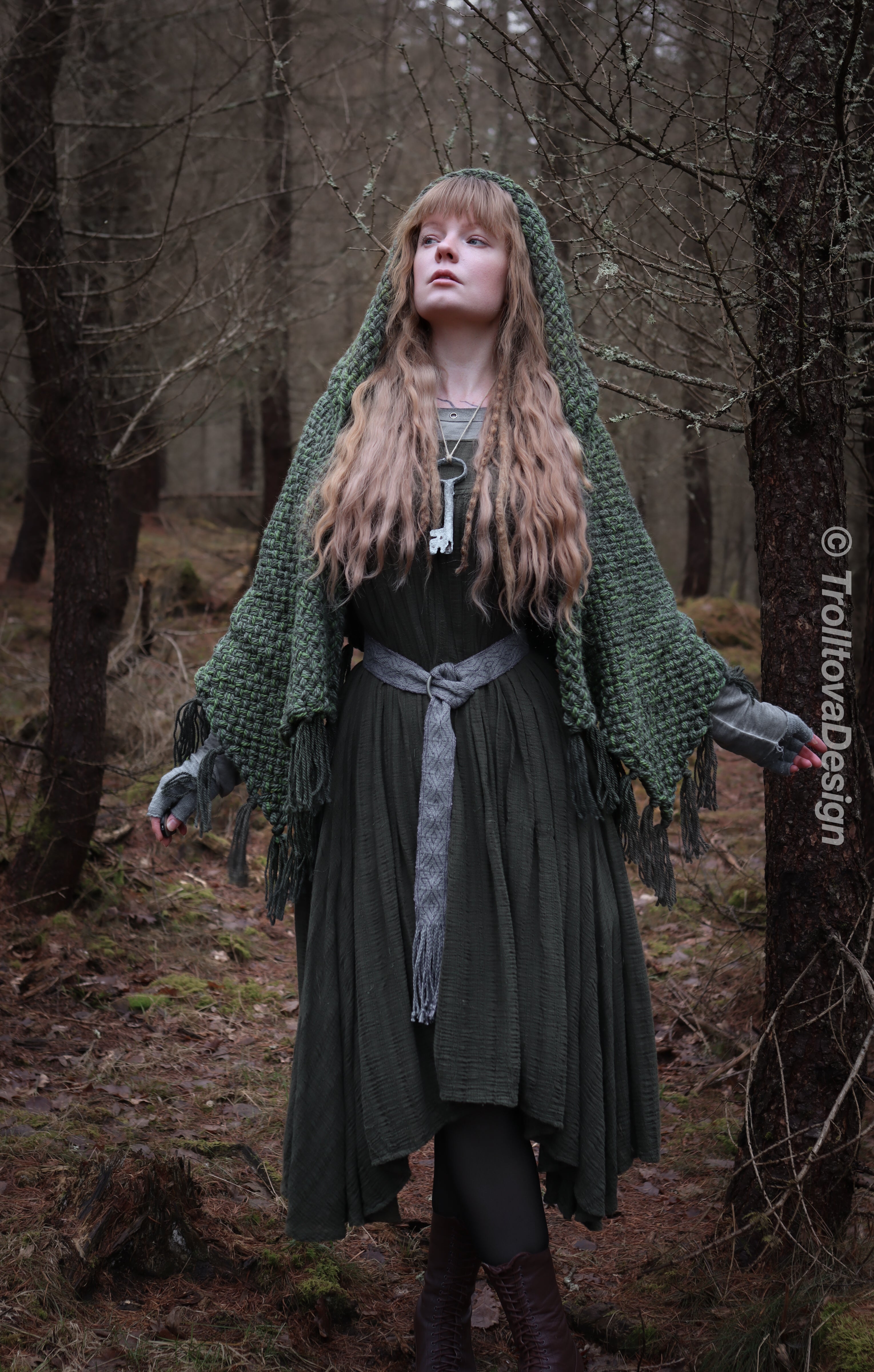Handwoven hooded shawl in forest green wool and alpaca.