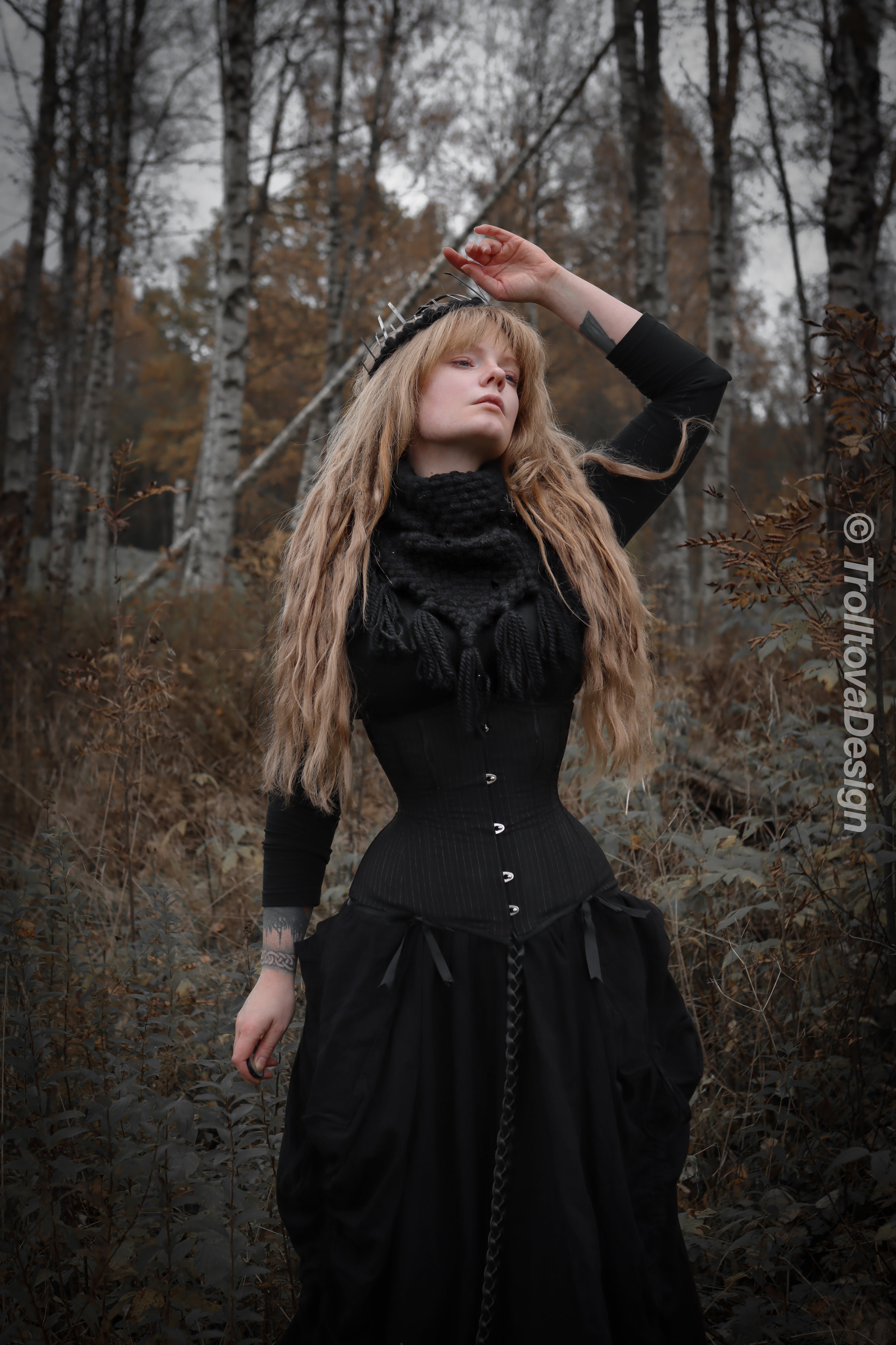 Handwoven triangle scarf in black wool and alpaca made from scrap yarn.