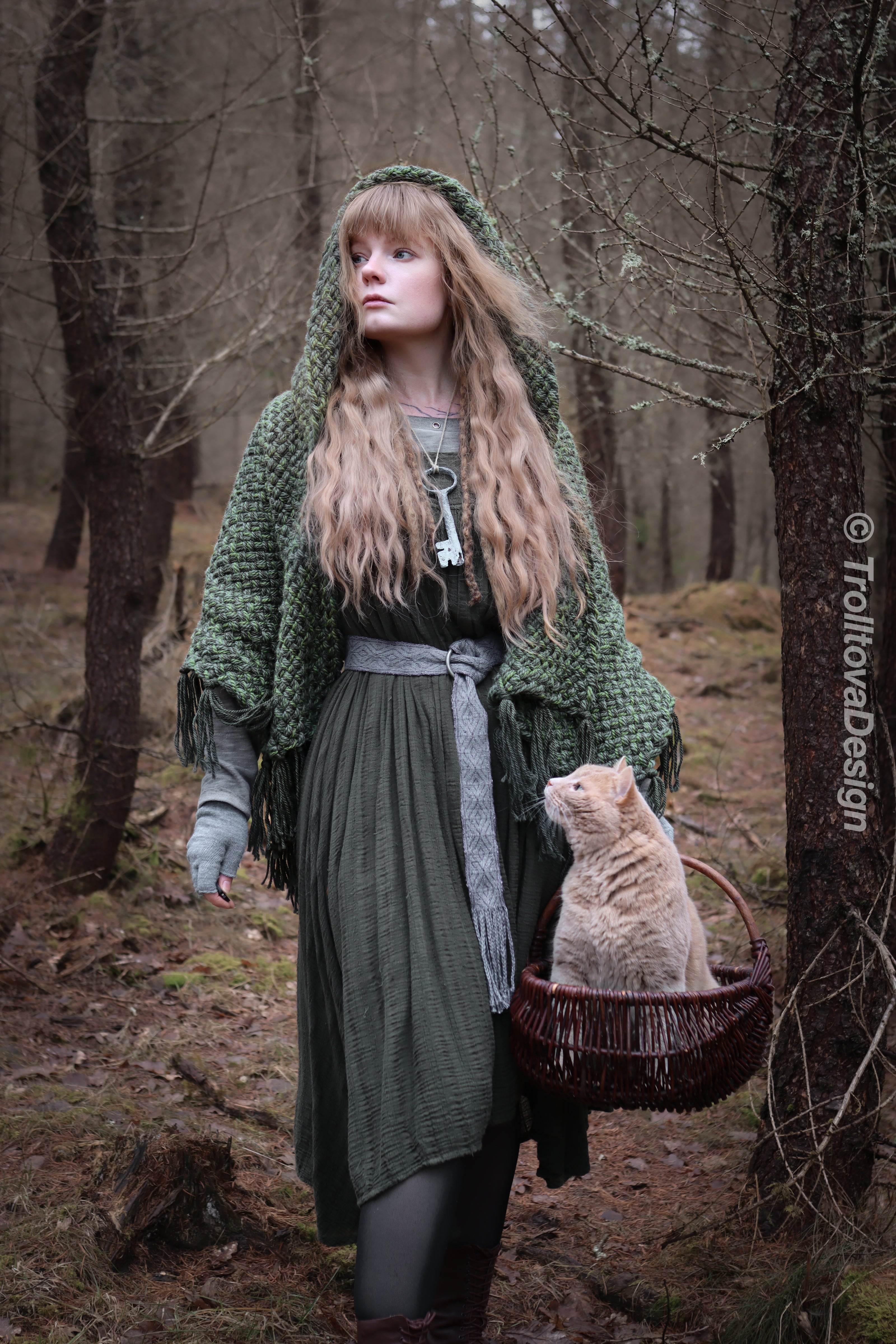 Handwoven hooded shawl in forest green wool and alpaca.