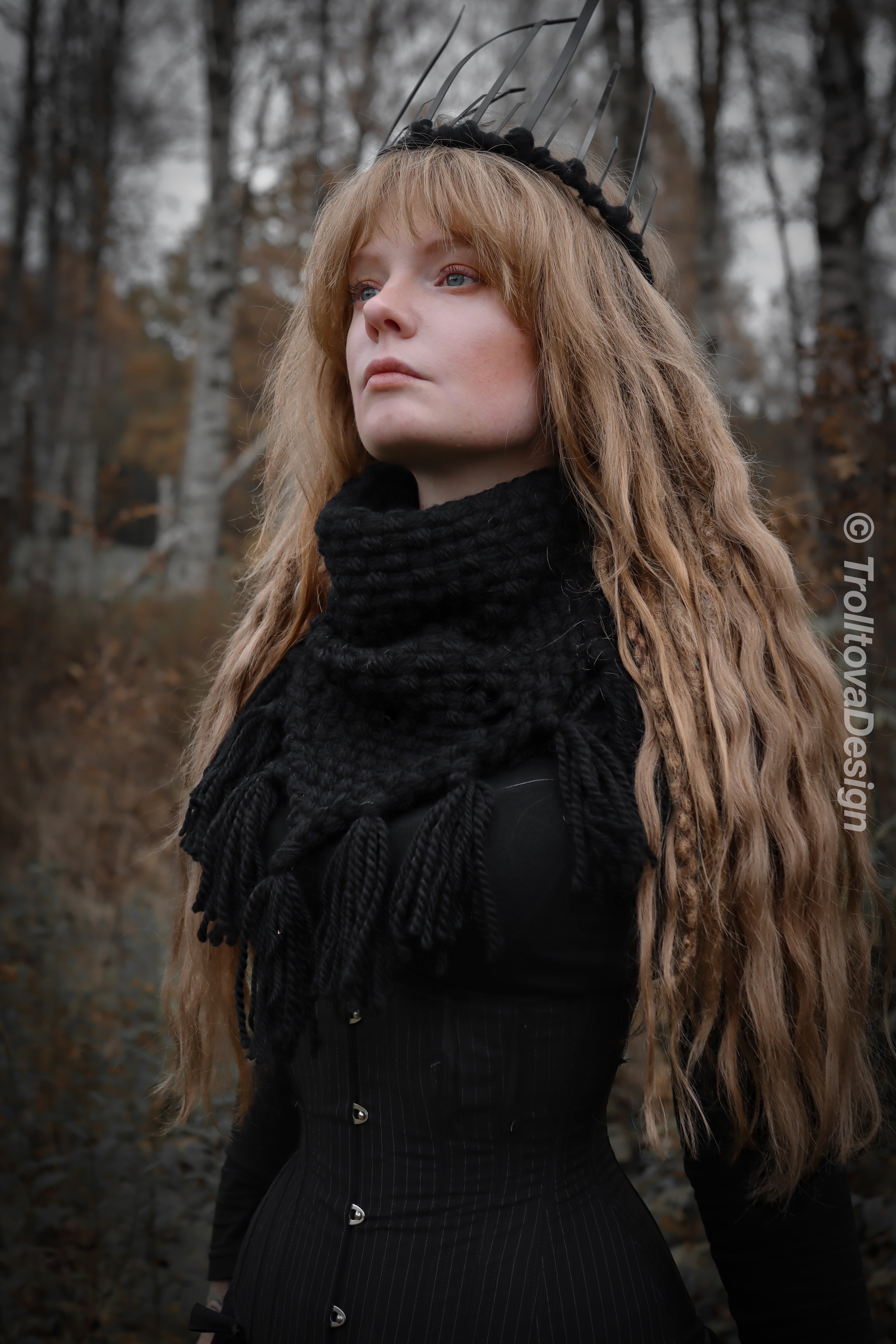 Handwoven triangle scarf in black wool and alpaca made from scrap yarn.