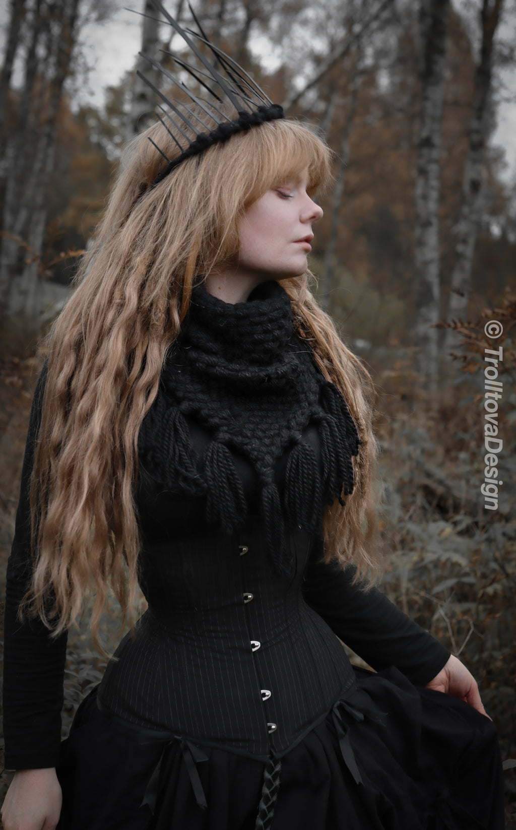 Handwoven triangle scarf in black wool and alpaca made from scrap yarn.