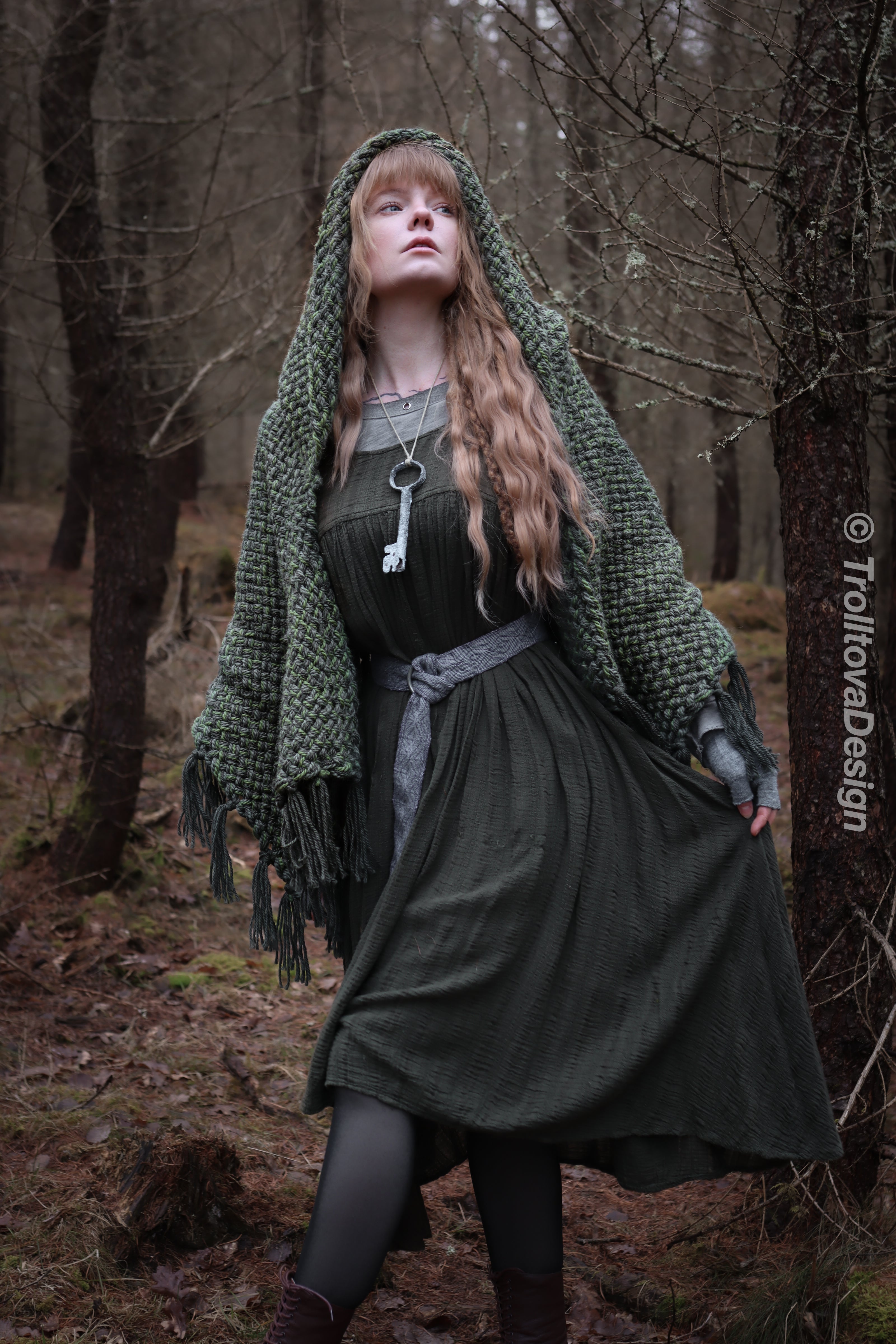 Handwoven hooded shawl in forest green wool and alpaca.