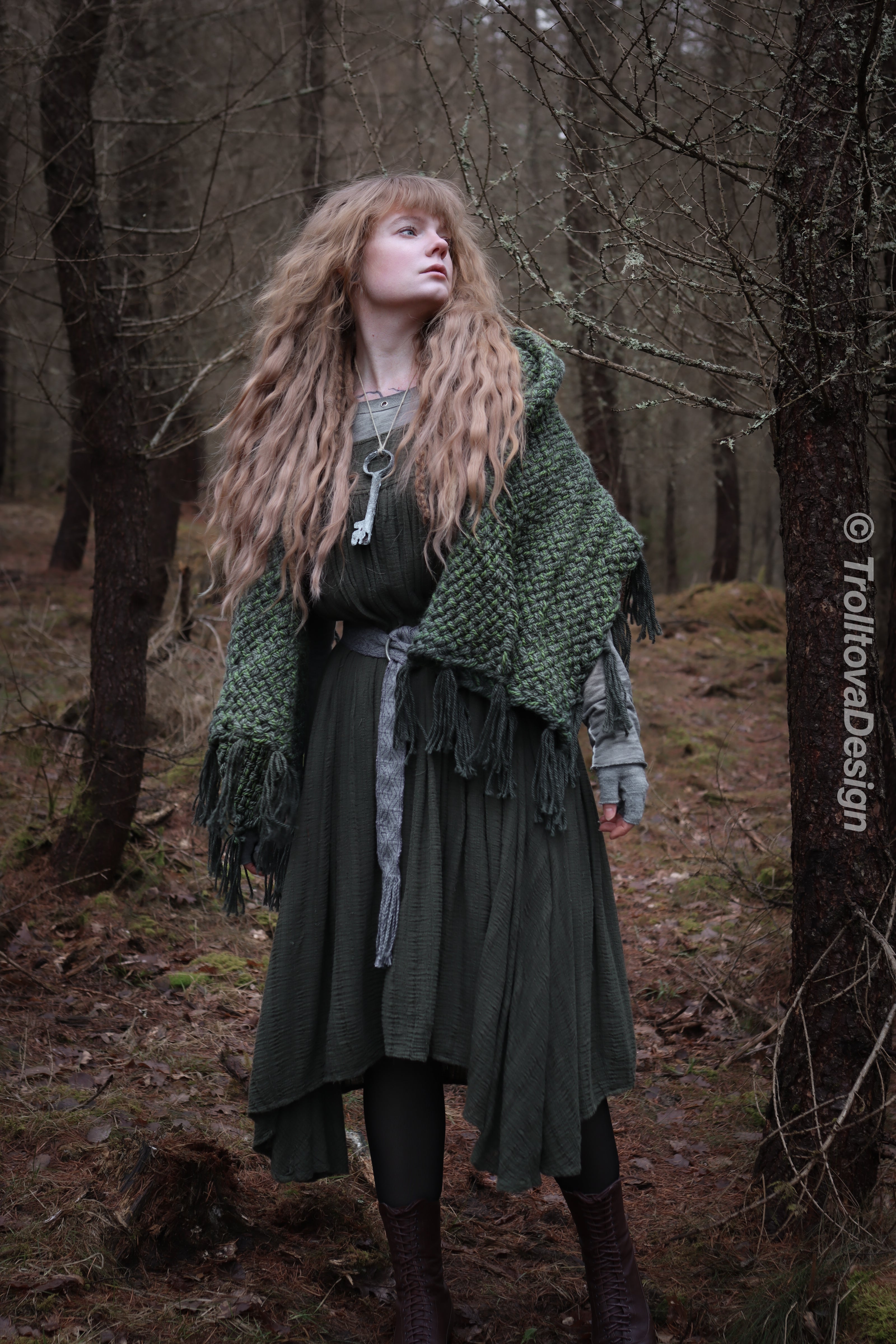 Handwoven hooded shawl in forest green wool and alpaca.