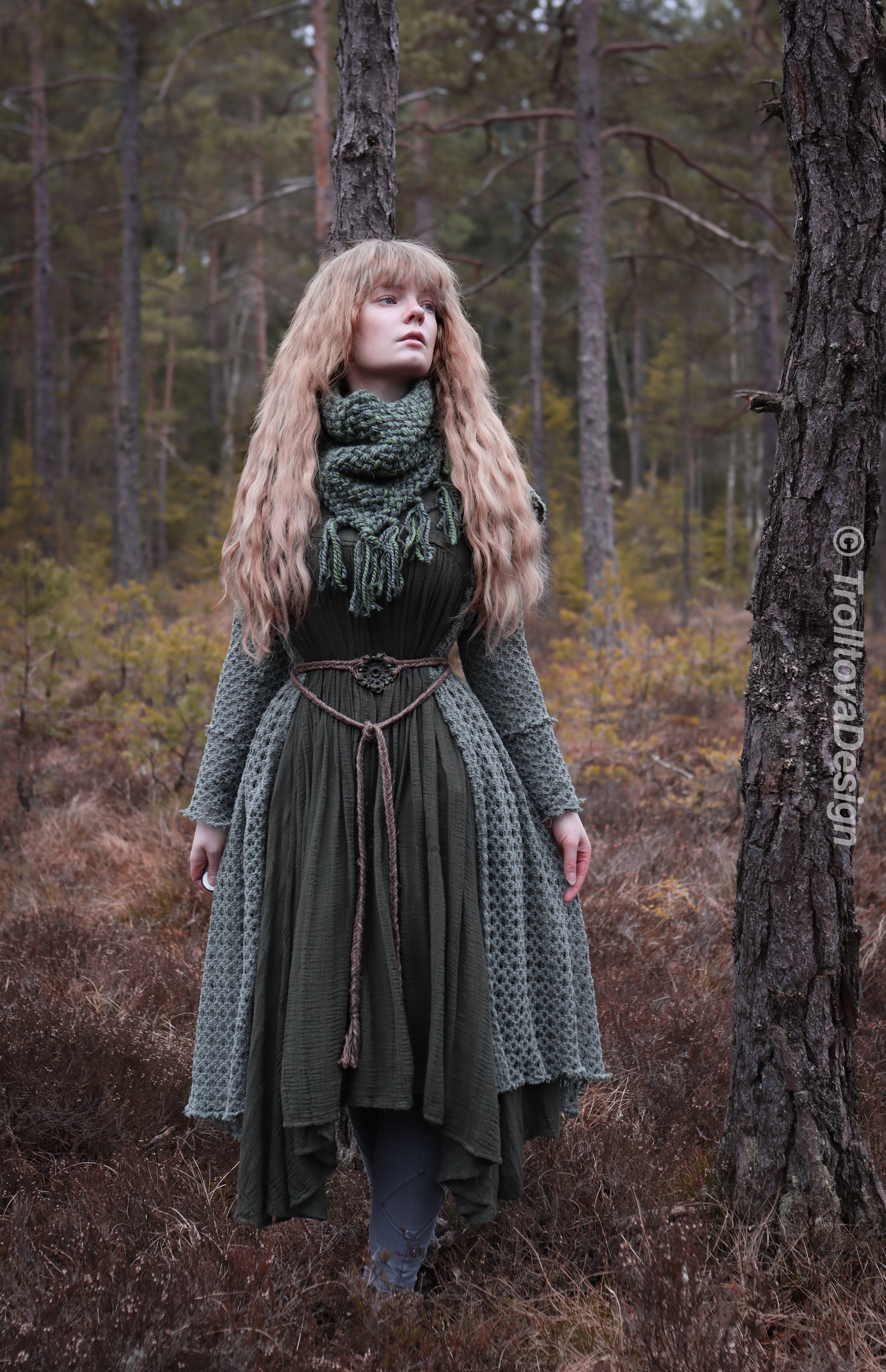 Handwoven triangle scarf in forest green wool and alpaca made from scrap yarn.
