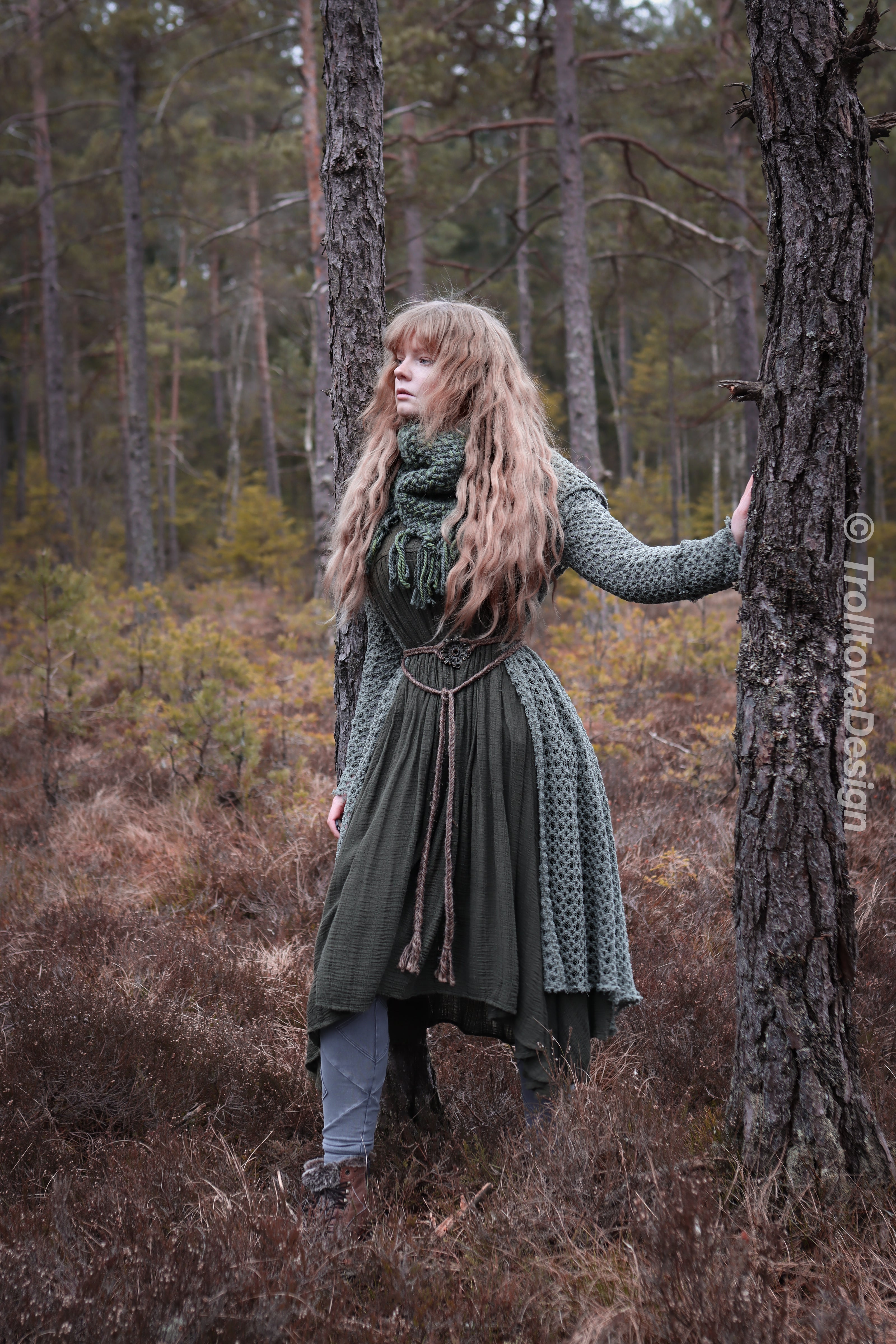 Handwoven triangle scarf in forest green wool and alpaca made from scrap yarn.
