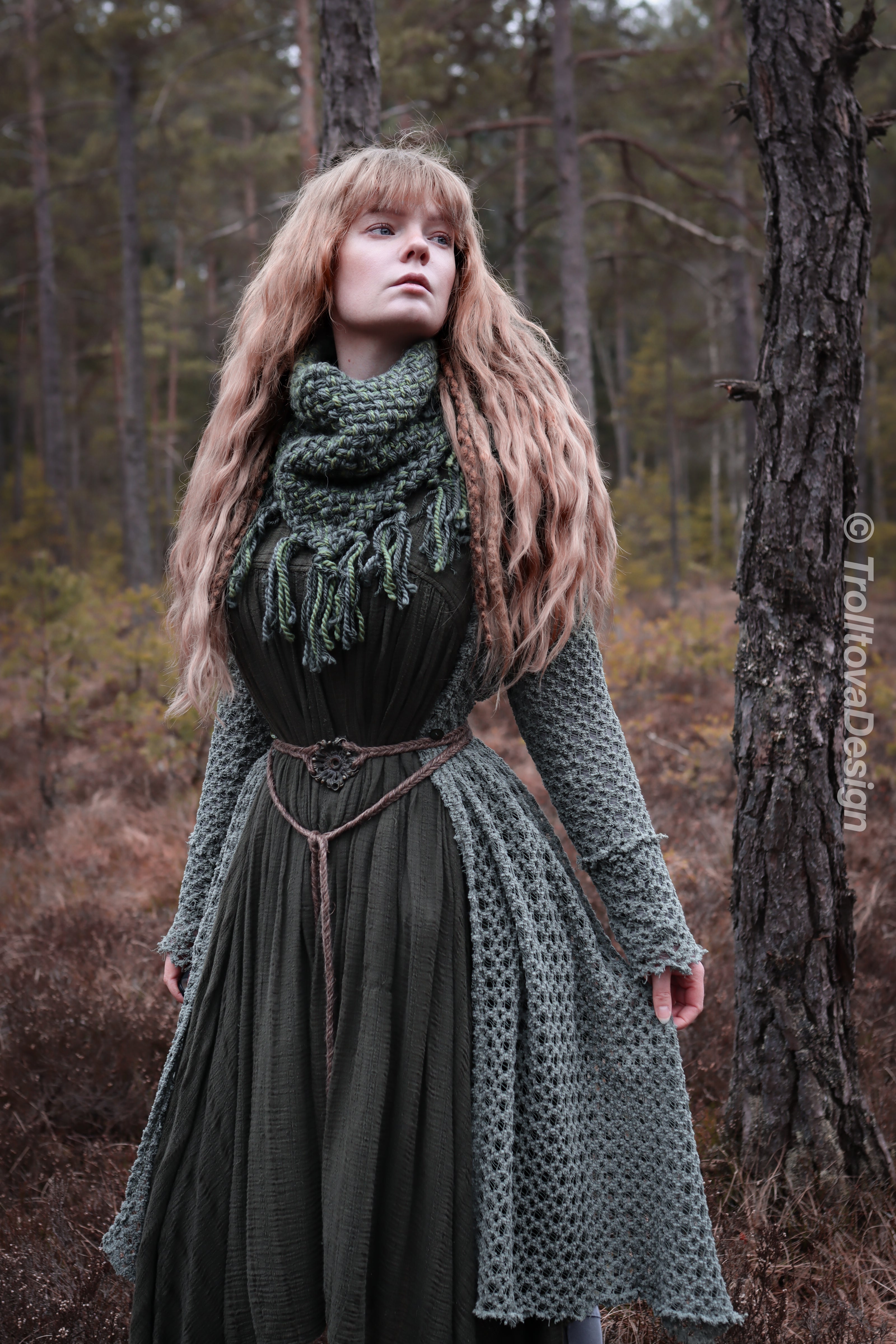 Handwoven triangle scarf in forest green wool and alpaca made from scrap yarn.