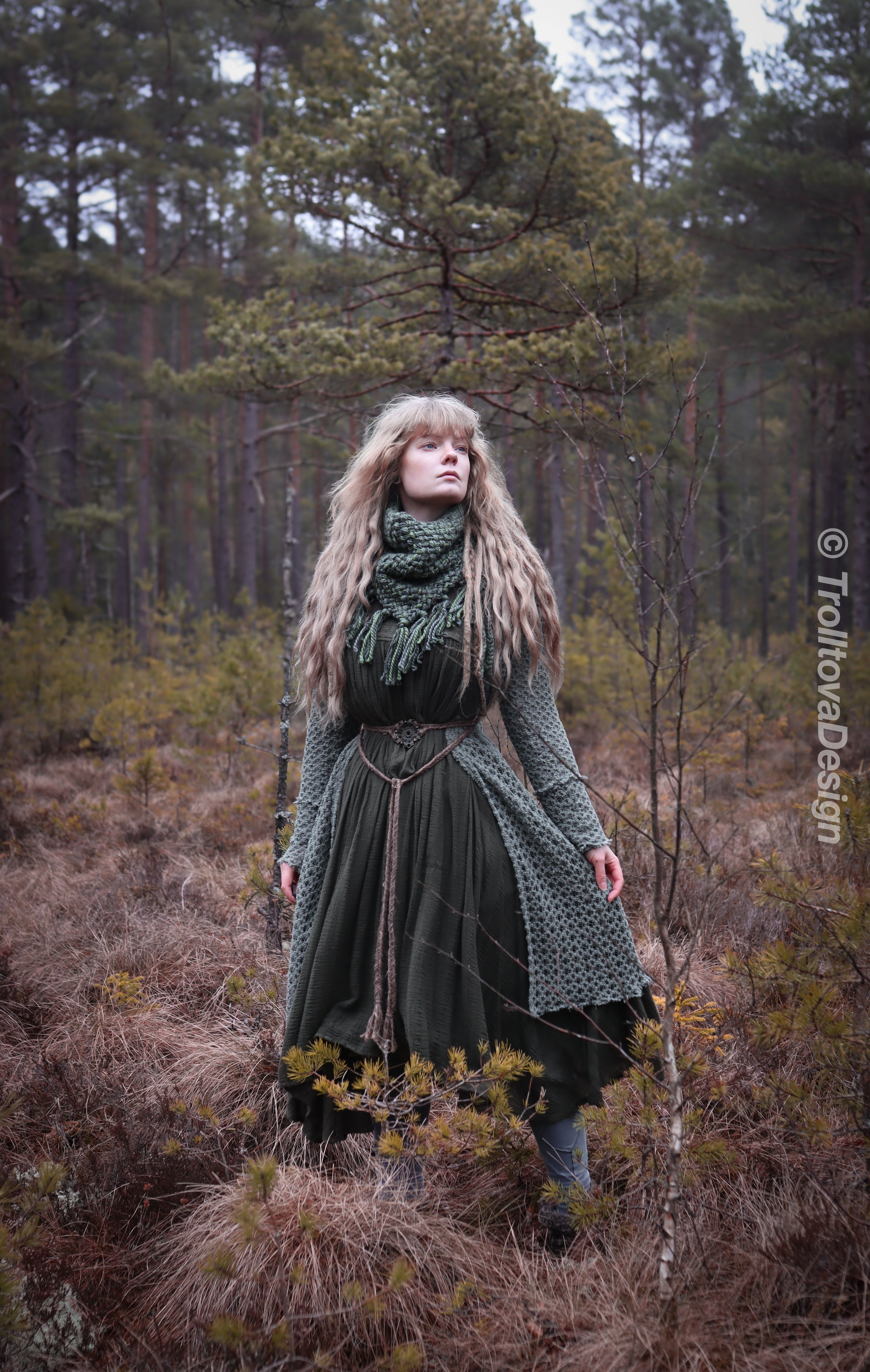 Handwoven triangle scarf in forest green wool and alpaca made from scrap yarn.