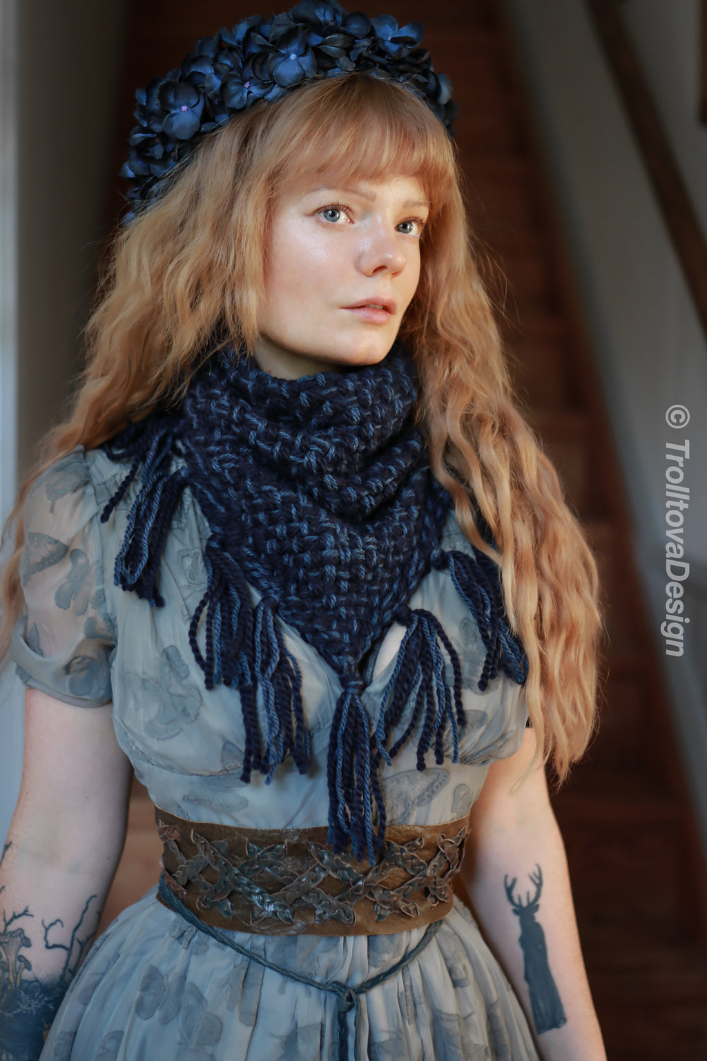 Handwoven triangle scarf in blue wool and alpaca, made from yarn scraps.