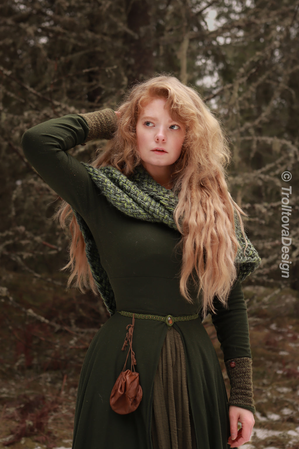 Handwoven twisted capelet in forest green wool and alpaca.