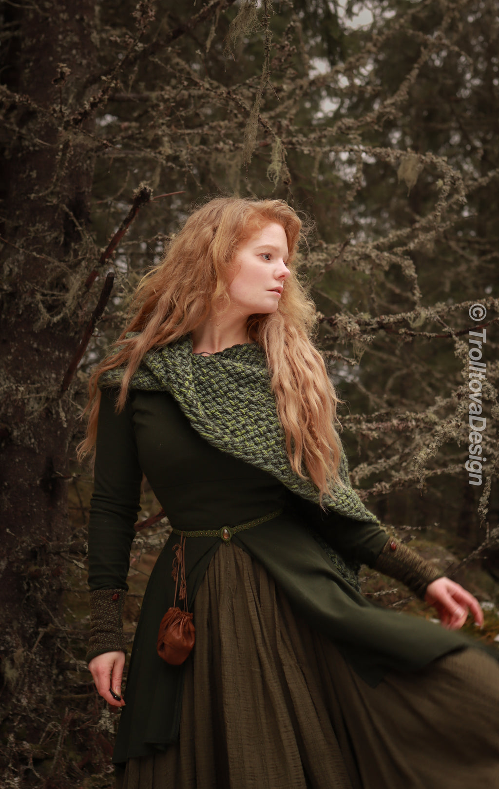 Handwoven twisted capelet in forest green wool and alpaca.