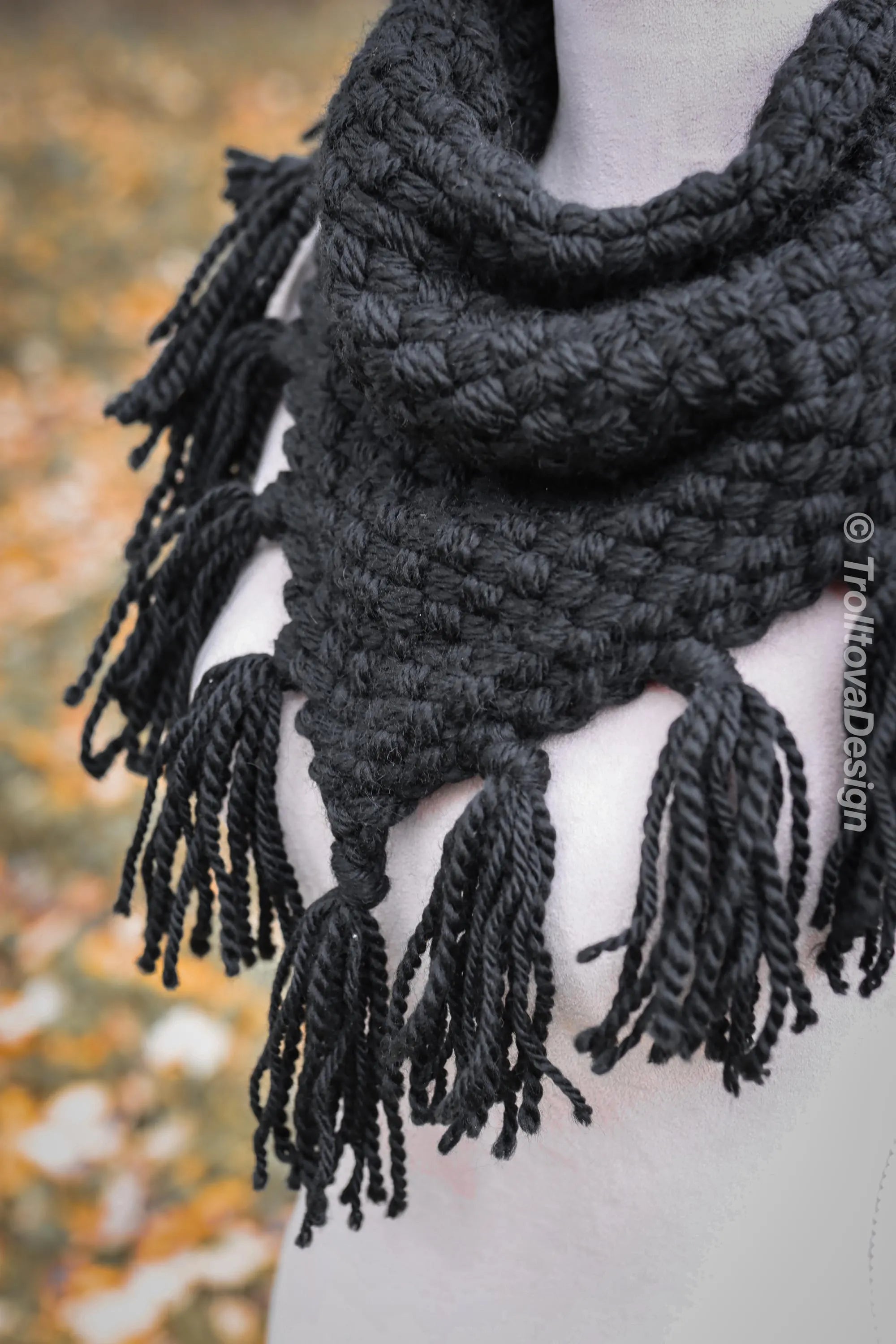 Handwoven triangle scarf in black wool and alpaca made from scrap yarn.