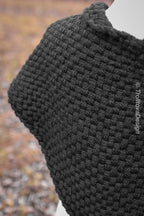 Handwoven twisted capelet in black wool and alpaca.