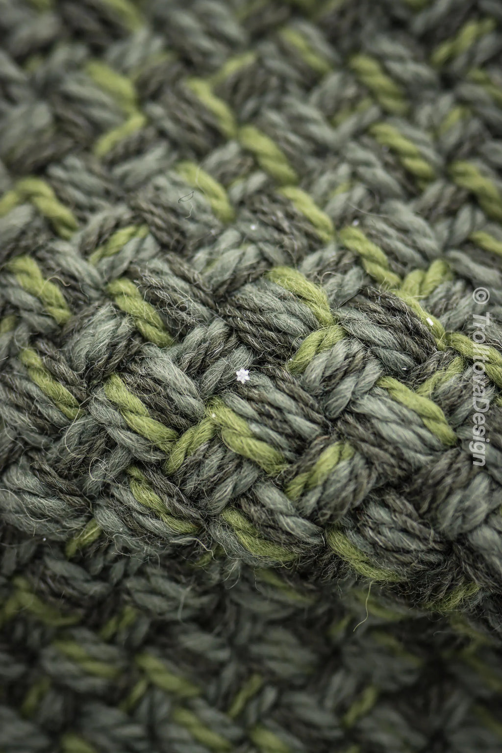 Small handwoven Skjoldehamn inspired hood in forest green wool and alpaca.