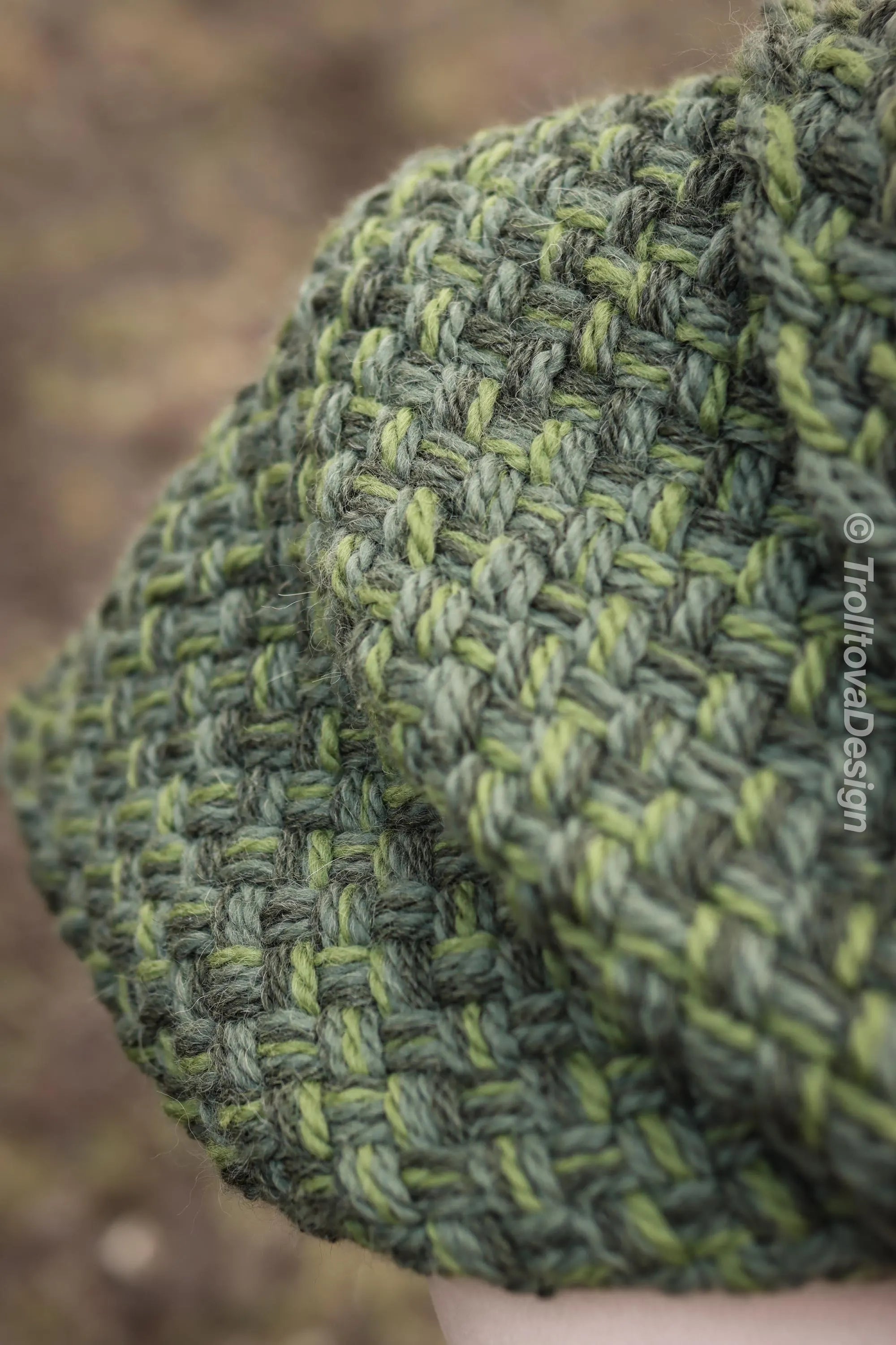 Handwoven twisted capelet in forest green wool and alpaca.