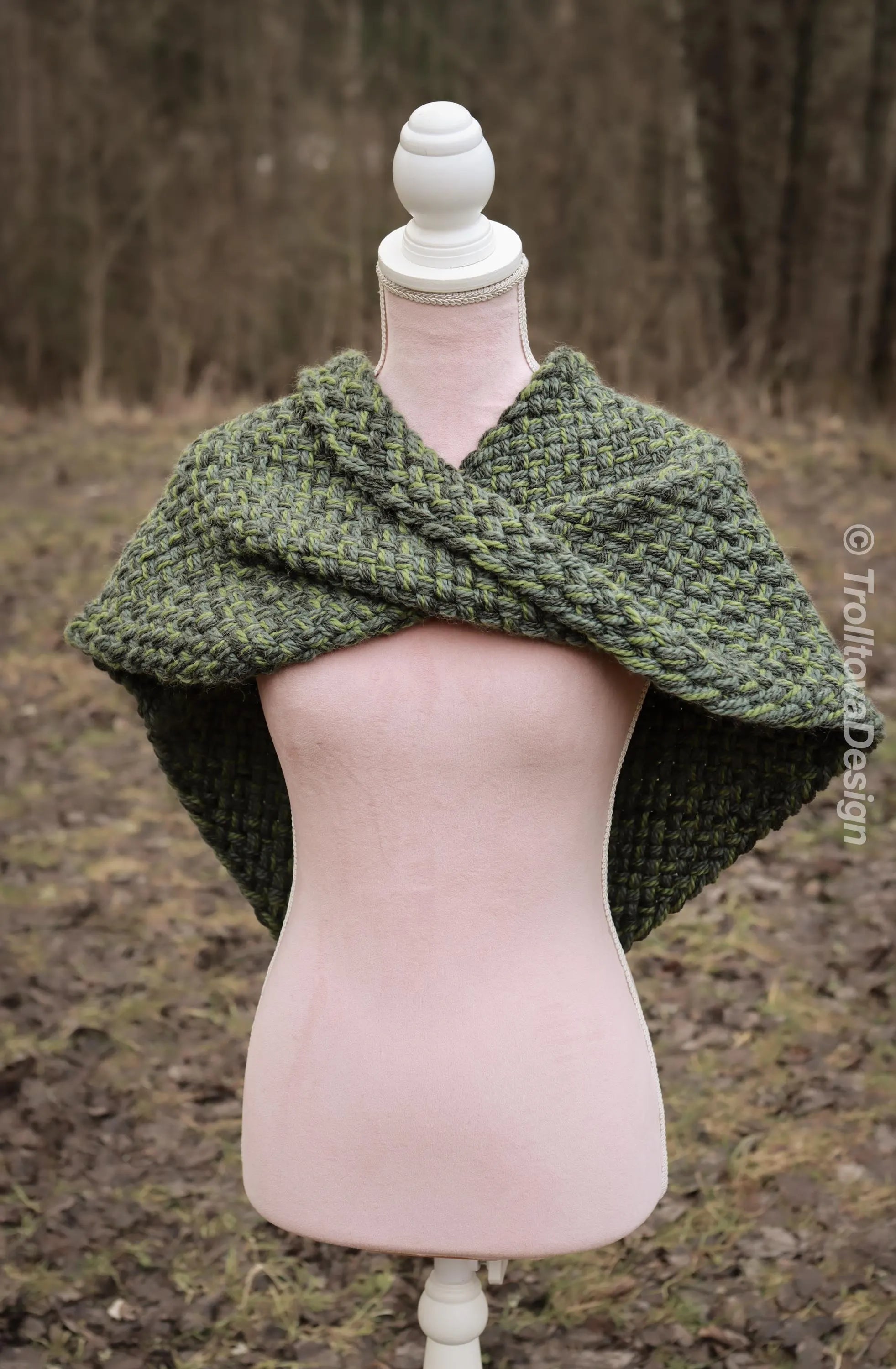 Handwoven twisted capelet in forest green wool and alpaca.