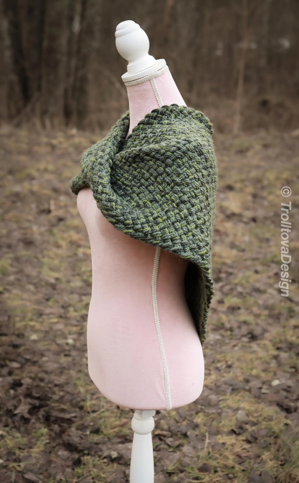 Handwoven twisted capelet in forest green wool and alpaca.