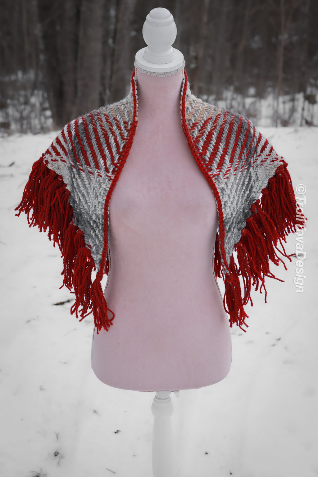 Handwoven triangle shawl made from yarn scraps.