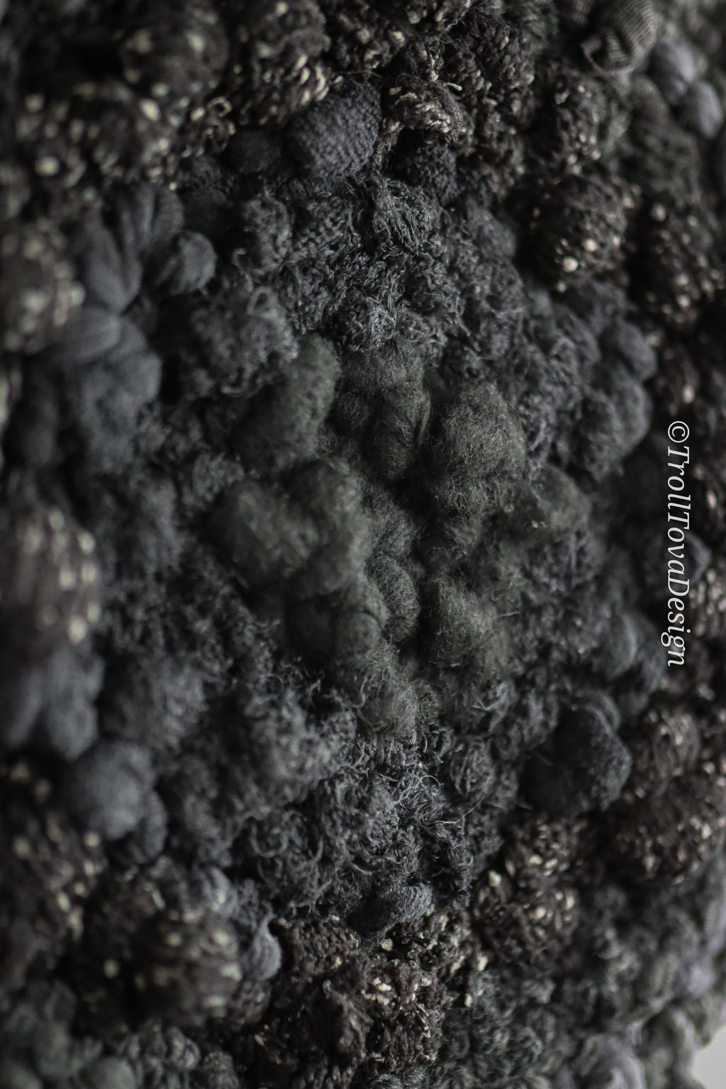 One of a kind handmade textile wall art in gray and black.