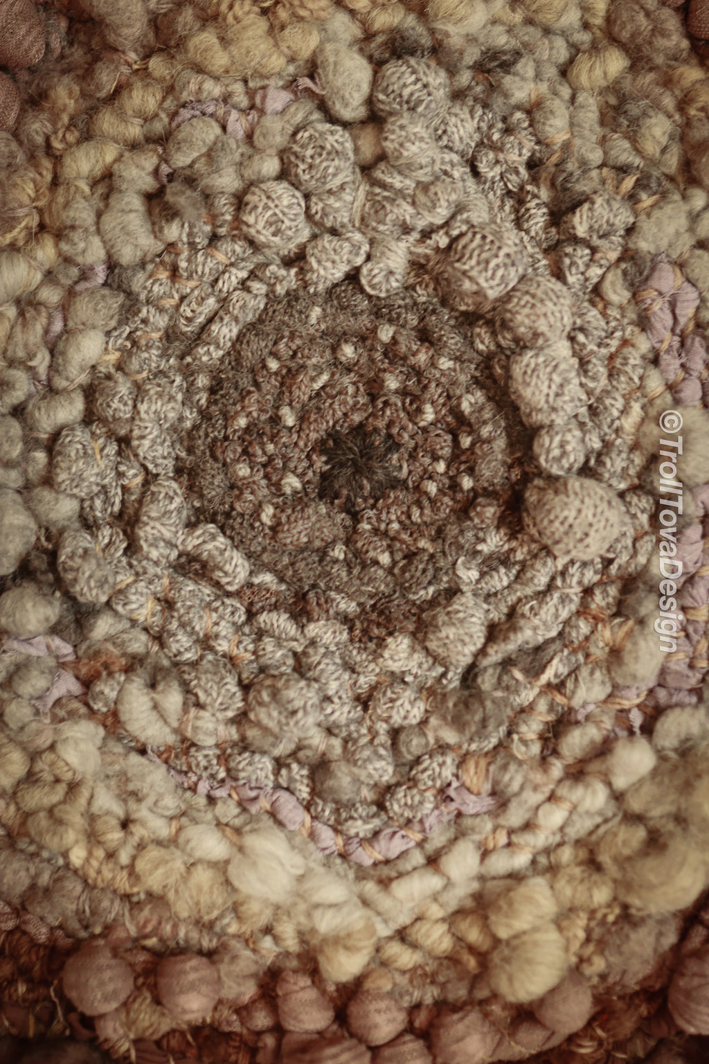 One of a kind handmade textile wall art in gray and brown.