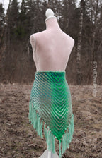 Handwoven triangle shawl made from yarn scraps.