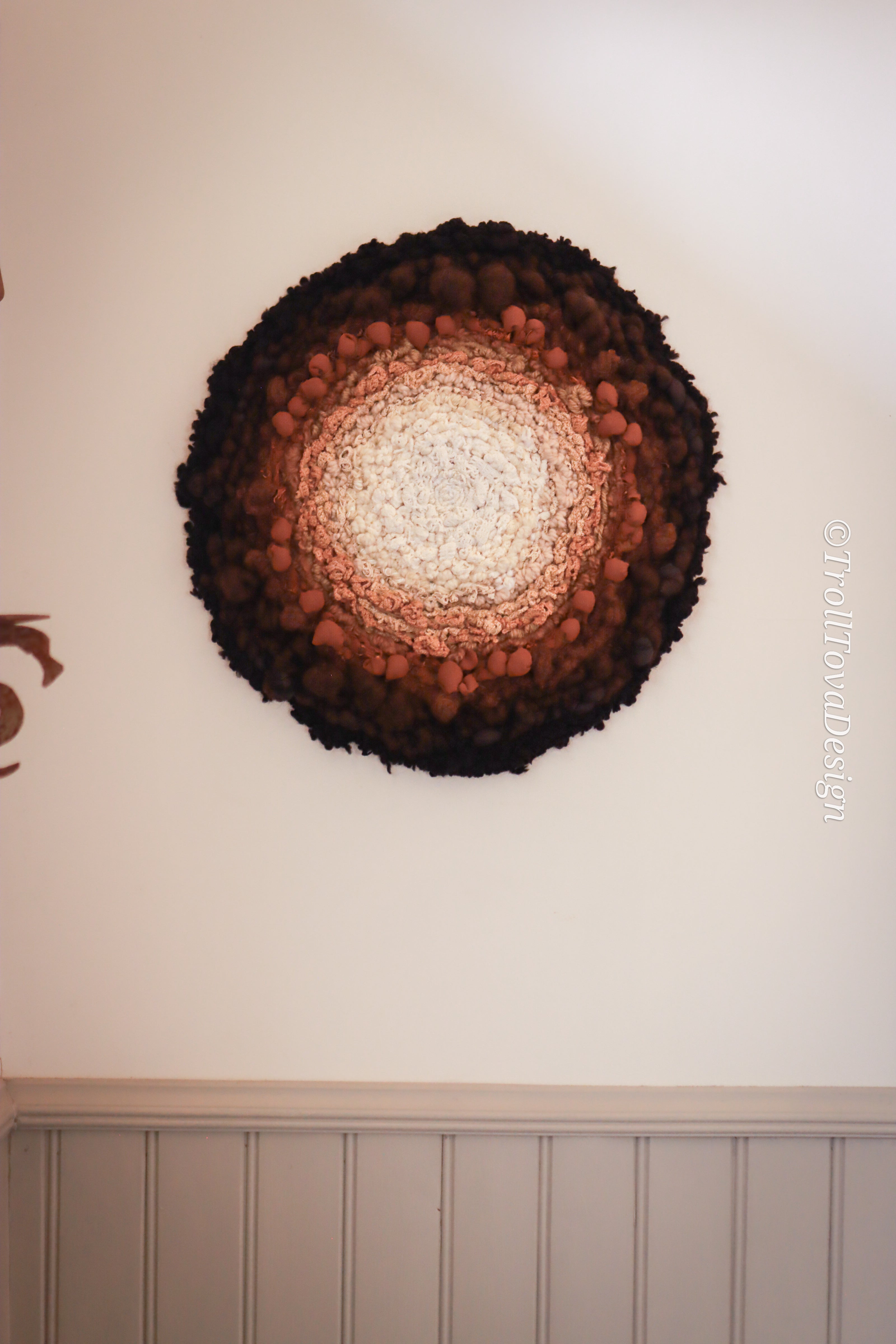 One of a kind handmade textile wall art in white, brown and black.