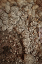 One of a kind handmade textile wall art in gray and brown.