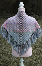 Handwoven triangle shawl made from yarn scraps.