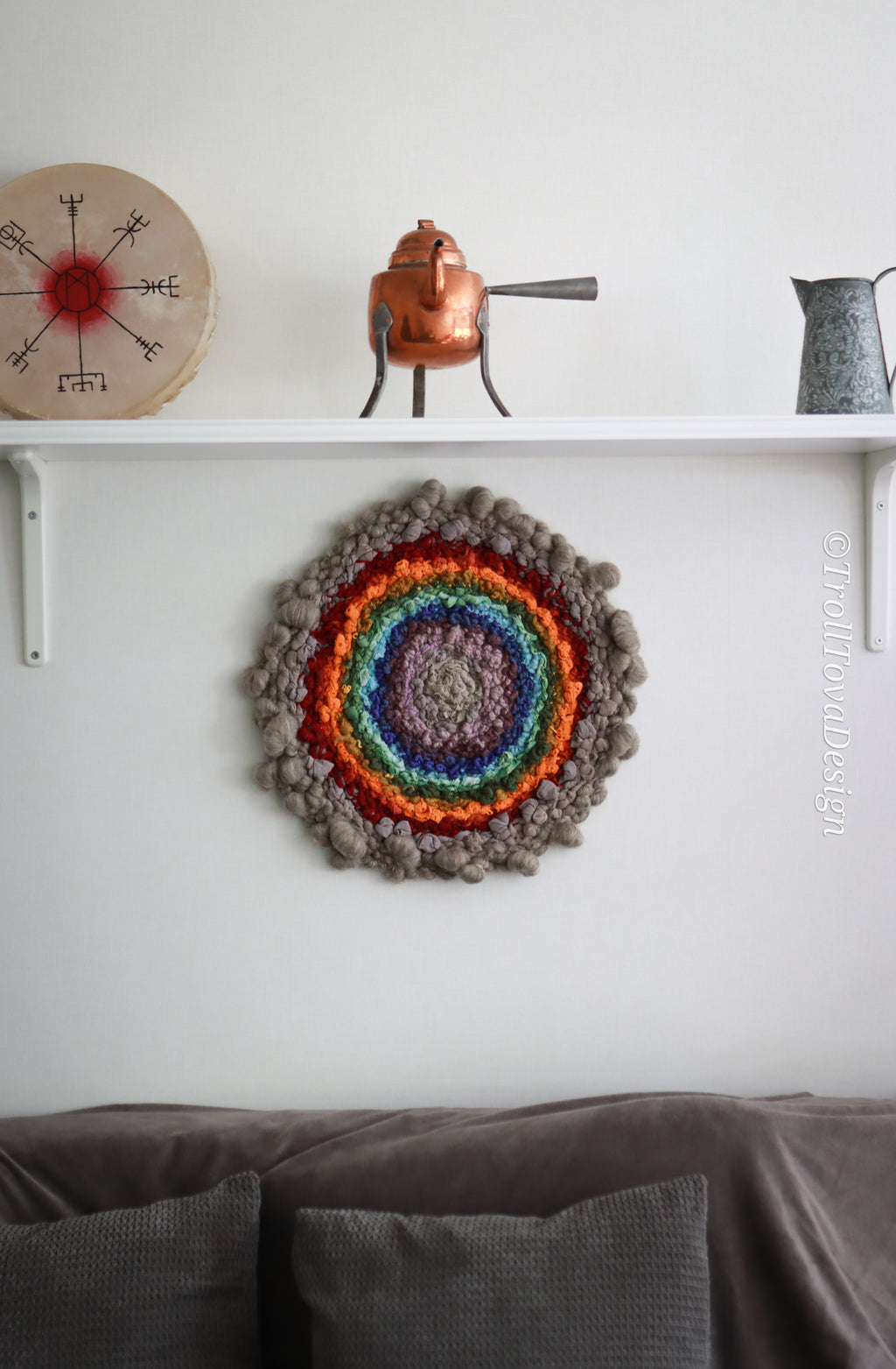 One of a kind handmade textile wall art in gray and rainbow.
