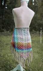 Handwoven triangle shawl made from yarn scraps.