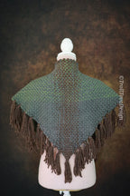 Handwoven triangle shawl made from yarn scraps.