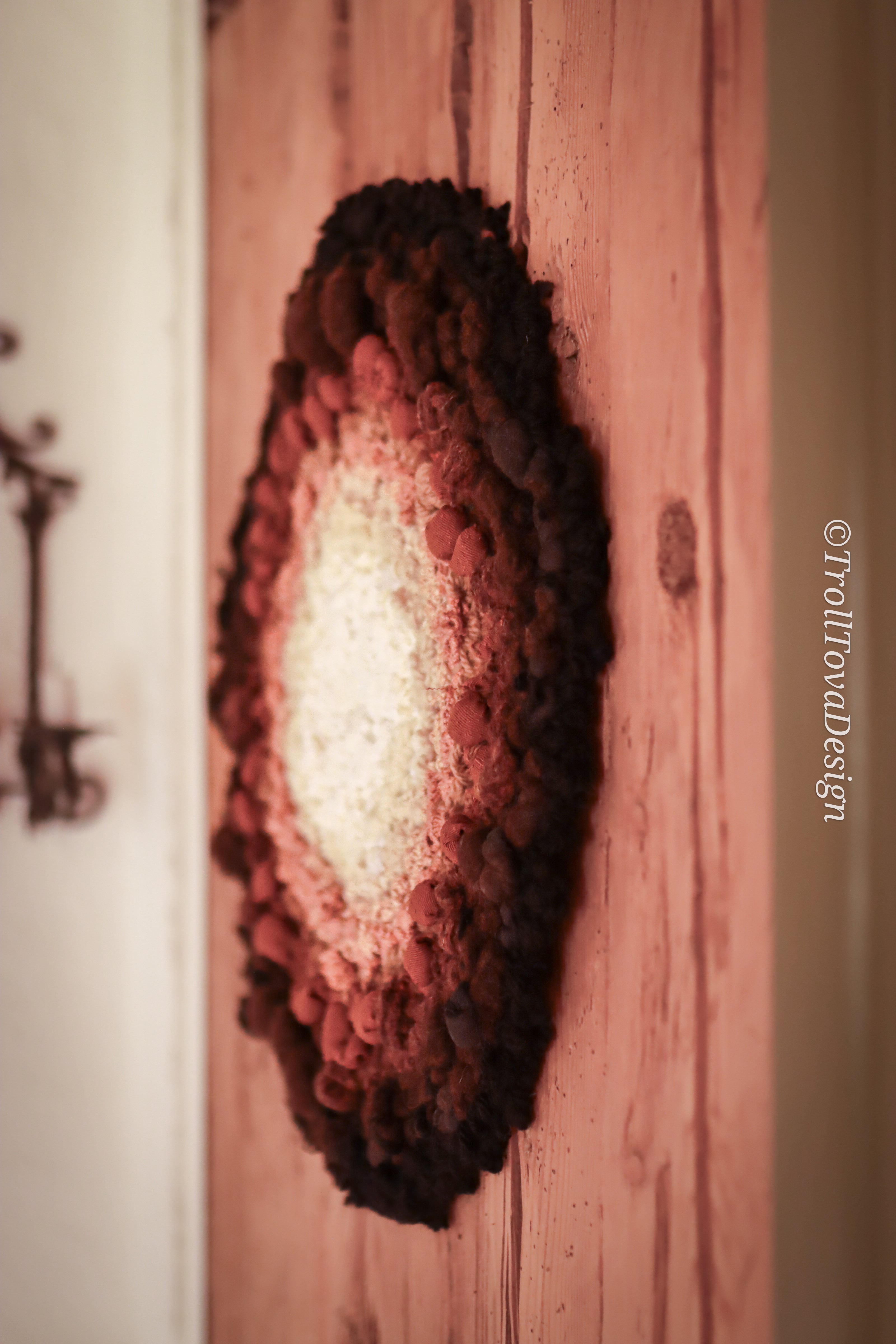 One of a kind handmade textile wall art in white, brown and black.