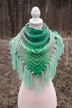 Handwoven triangle shawl made from yarn scraps.