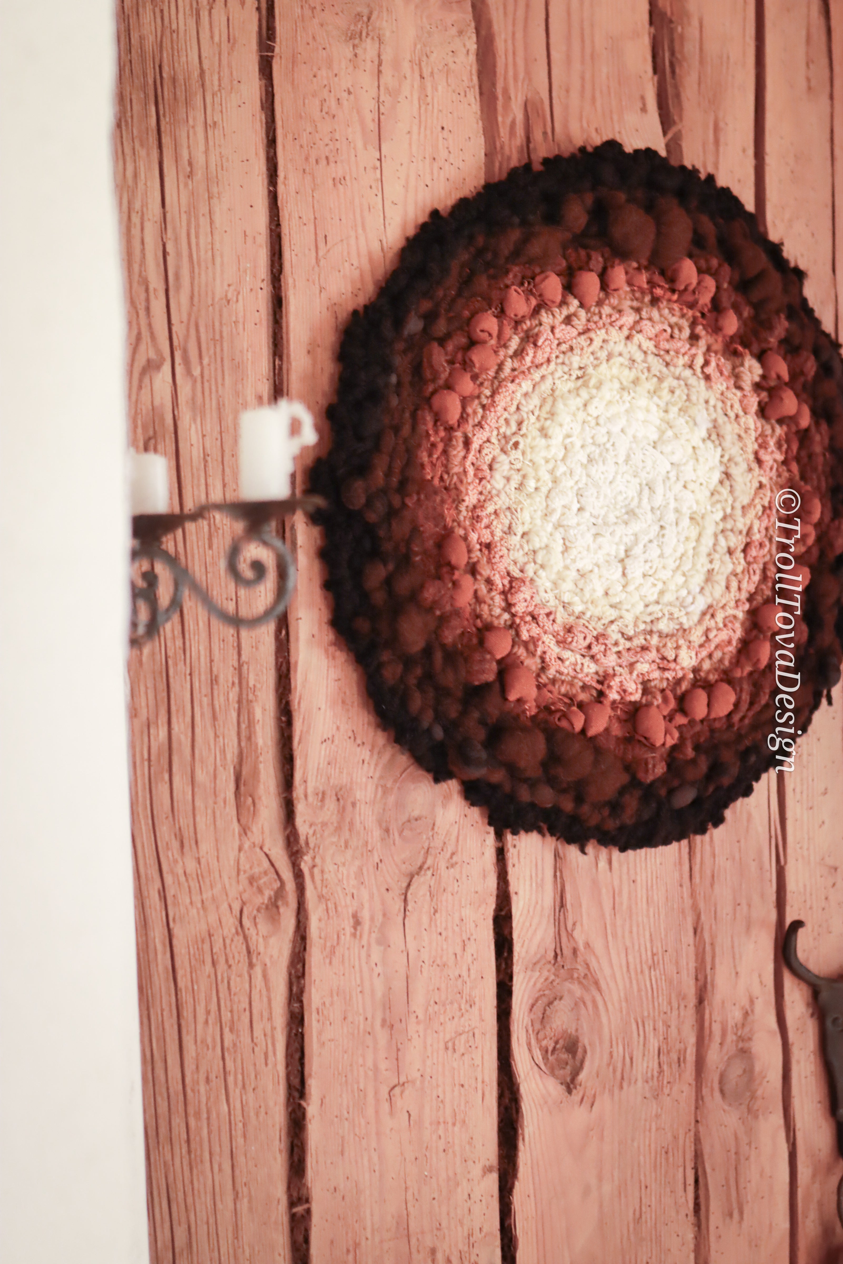 One of a kind handmade textile wall art in white, brown and black.