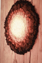 One of a kind handmade textile wall art in white, brown and black.