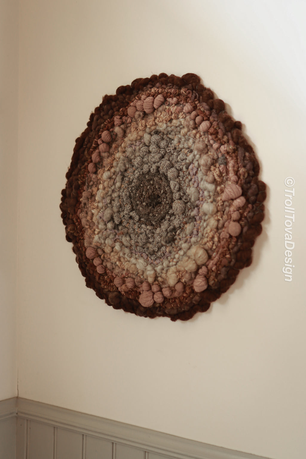 One of a kind handmade textile wall art in gray and brown.