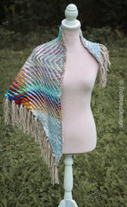 Handwoven triangle shawl made from yarn scraps.