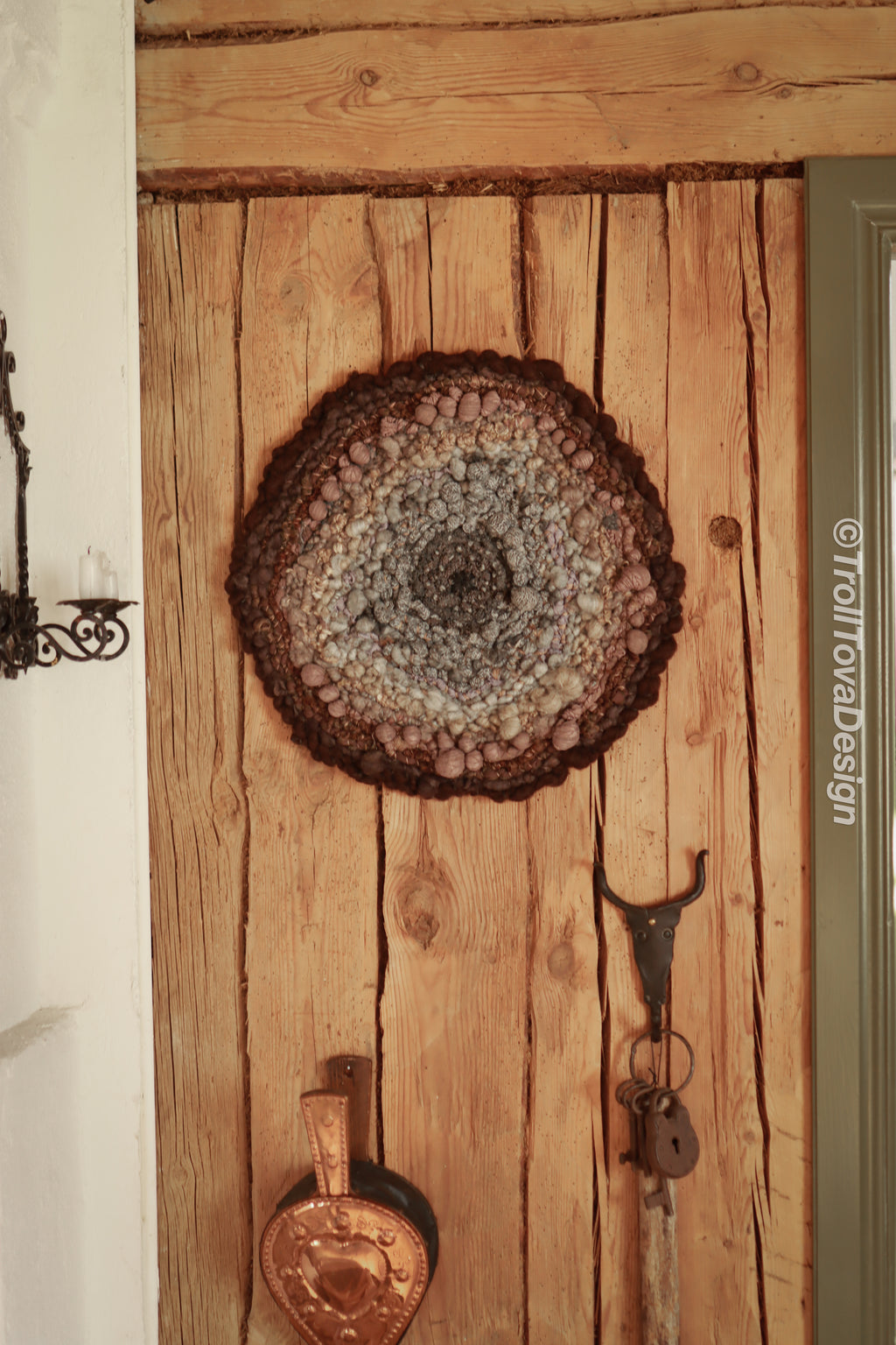 One of a kind handmade textile wall art in gray and brown.