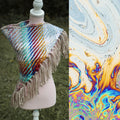Handwoven triangle shawl made from yarn scraps.