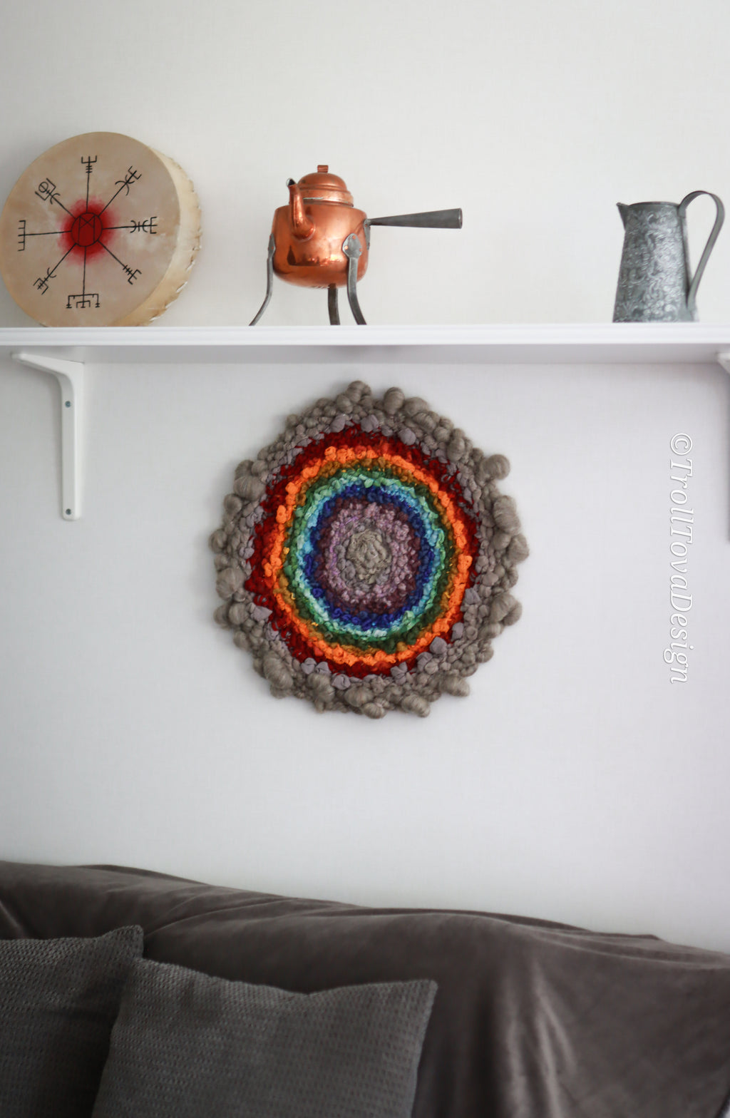 One of a kind handmade textile wall art in gray and rainbow.