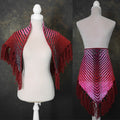 Handwoven triangle shawl made from yarn scraps.