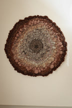 One of a kind handmade textile wall art in gray and brown.
