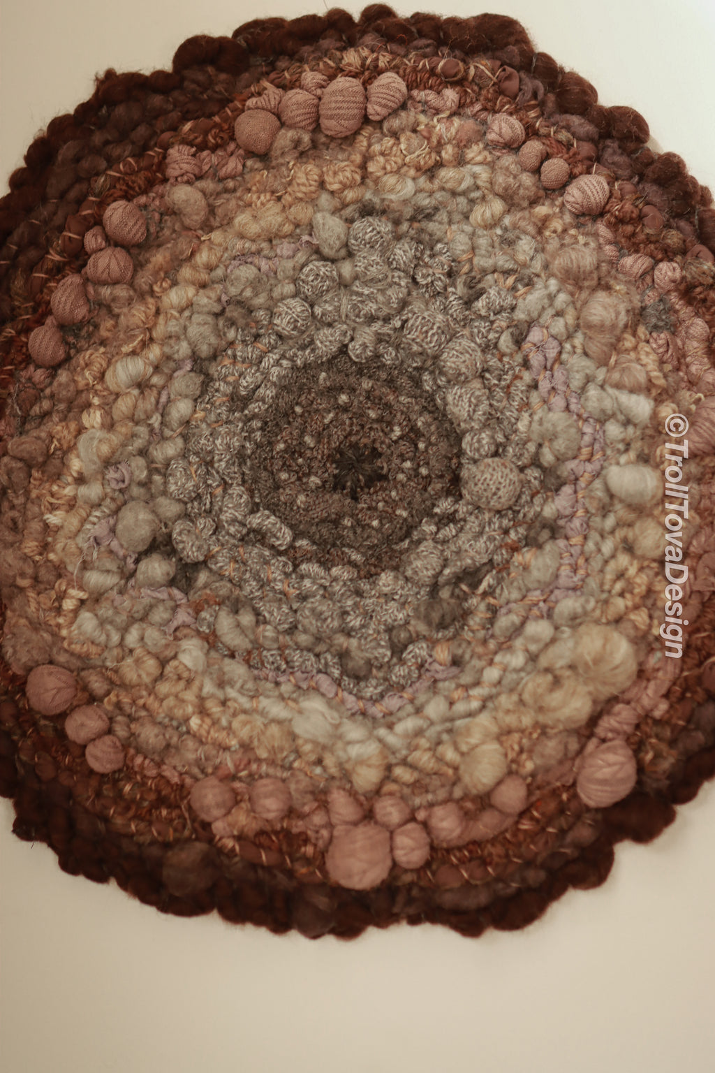 One of a kind handmade textile wall art in gray and brown.