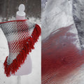 Handwoven triangle shawl made from yarn scraps.