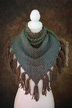 Handwoven triangle shawl made from yarn scraps.