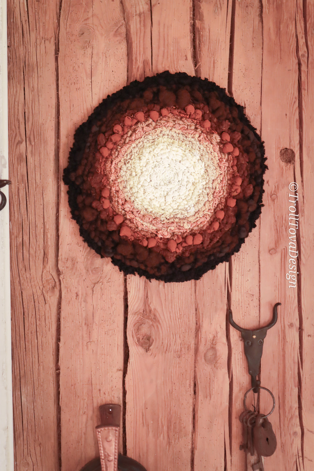 One of a kind handmade textile wall art in white, brown and black.