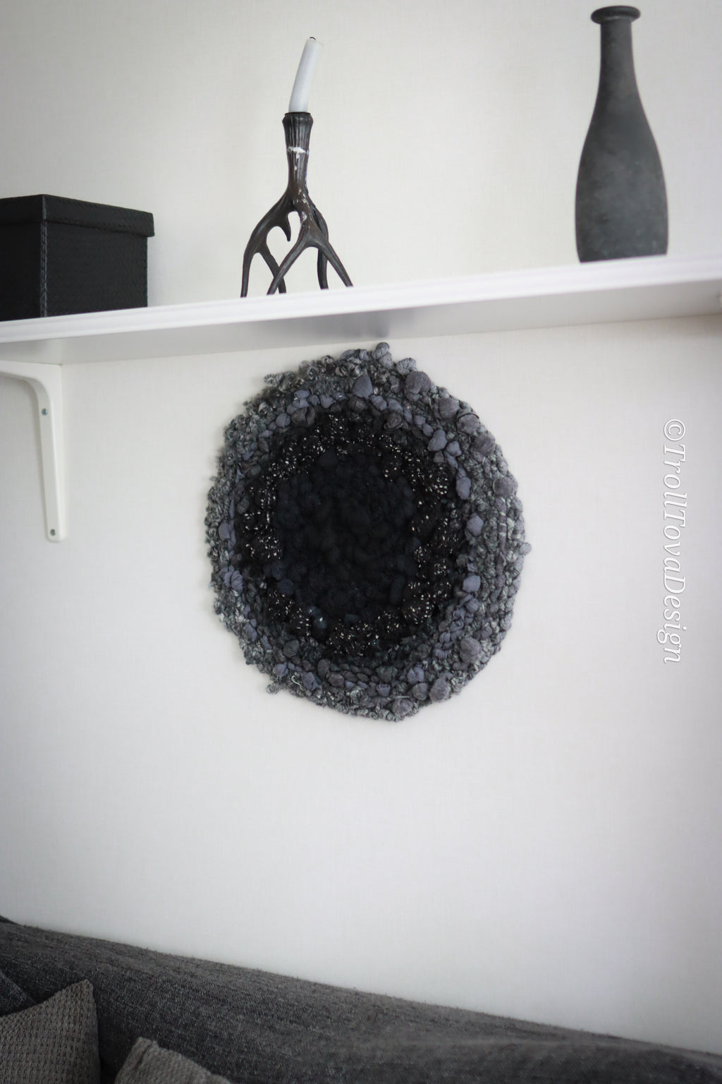 One of a kind handmade textile wall art in gray and black.