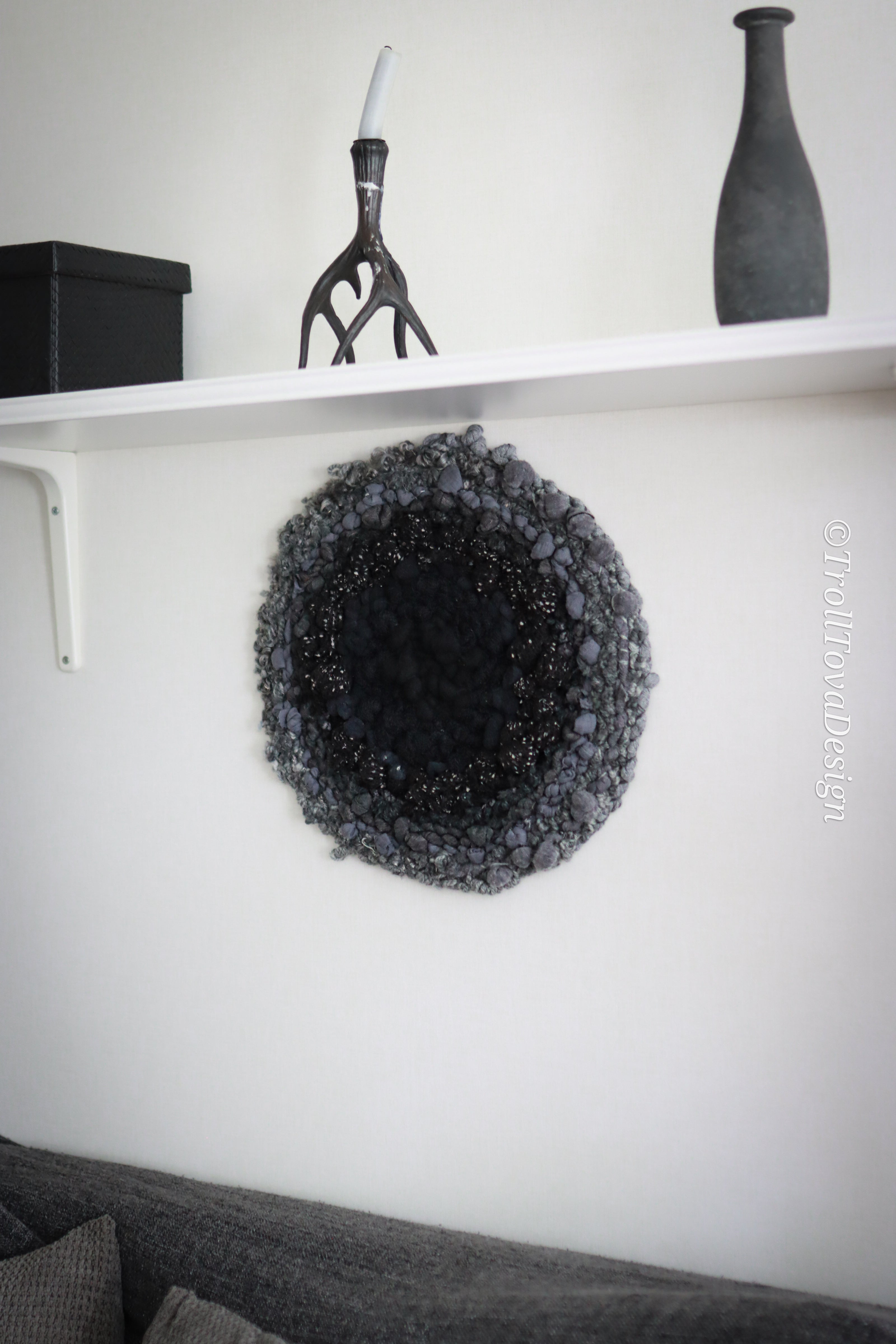 One of a kind handmade textile wall art in gray and black.