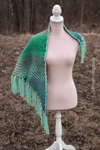 Handwoven triangle shawl made from yarn scraps.