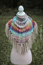 Handwoven triangle shawl made from yarn scraps.